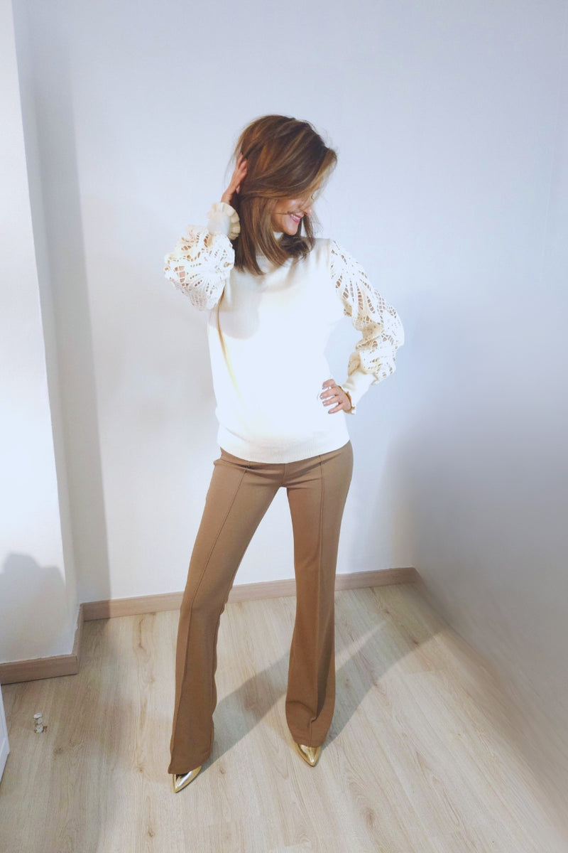 Beige blouse with lace sleeves