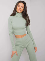 Light green two-piece set with collared bust and shoulder pads and flared pants